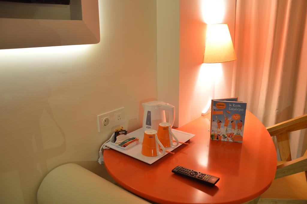 Harris Hotel Raya 꾸따 객실 사진