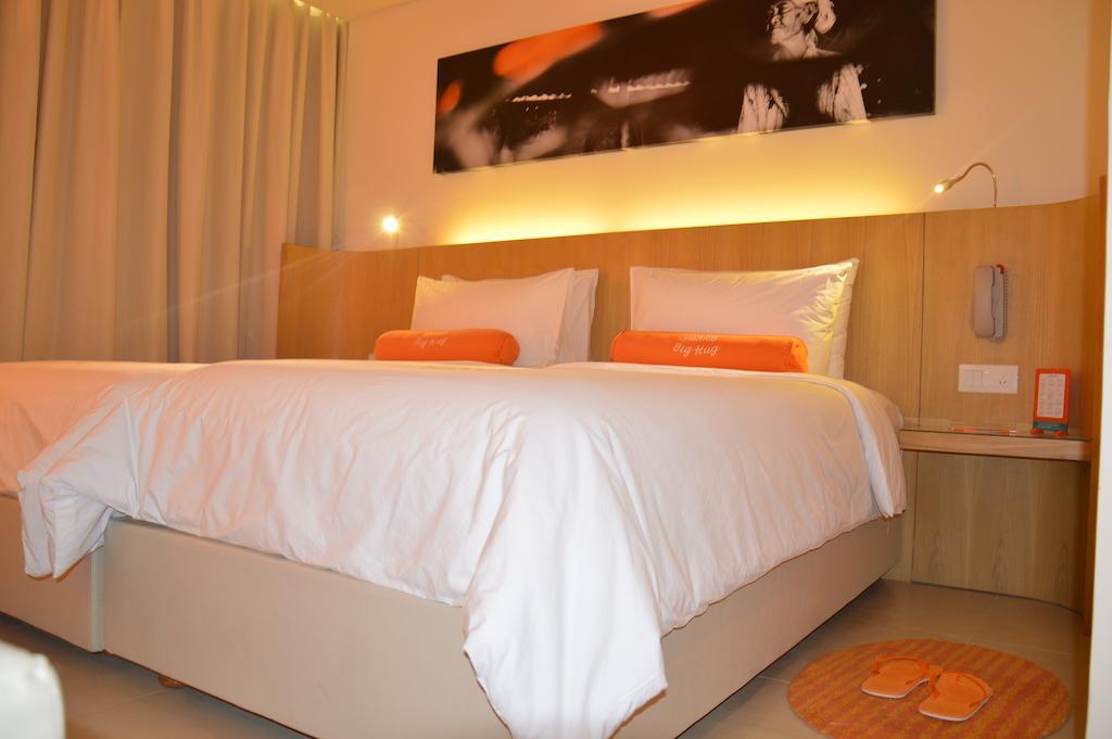 Harris Hotel Raya 꾸따 객실 사진